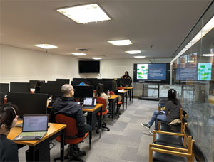 Students sitting in computer lab during a writing workshop